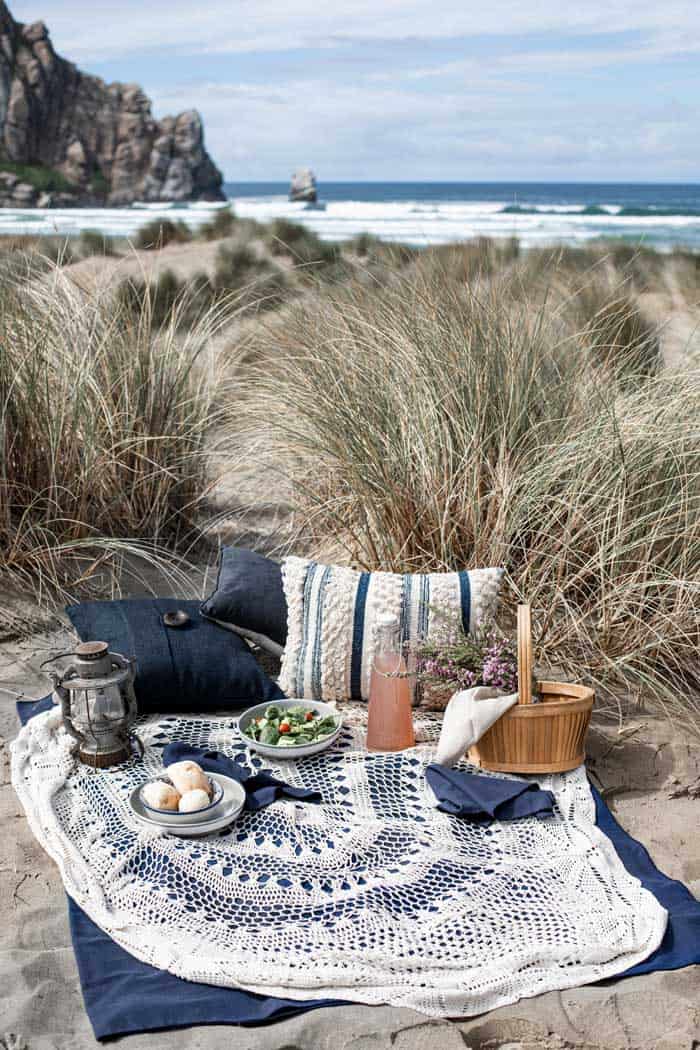Romantic beach picnic setting. 