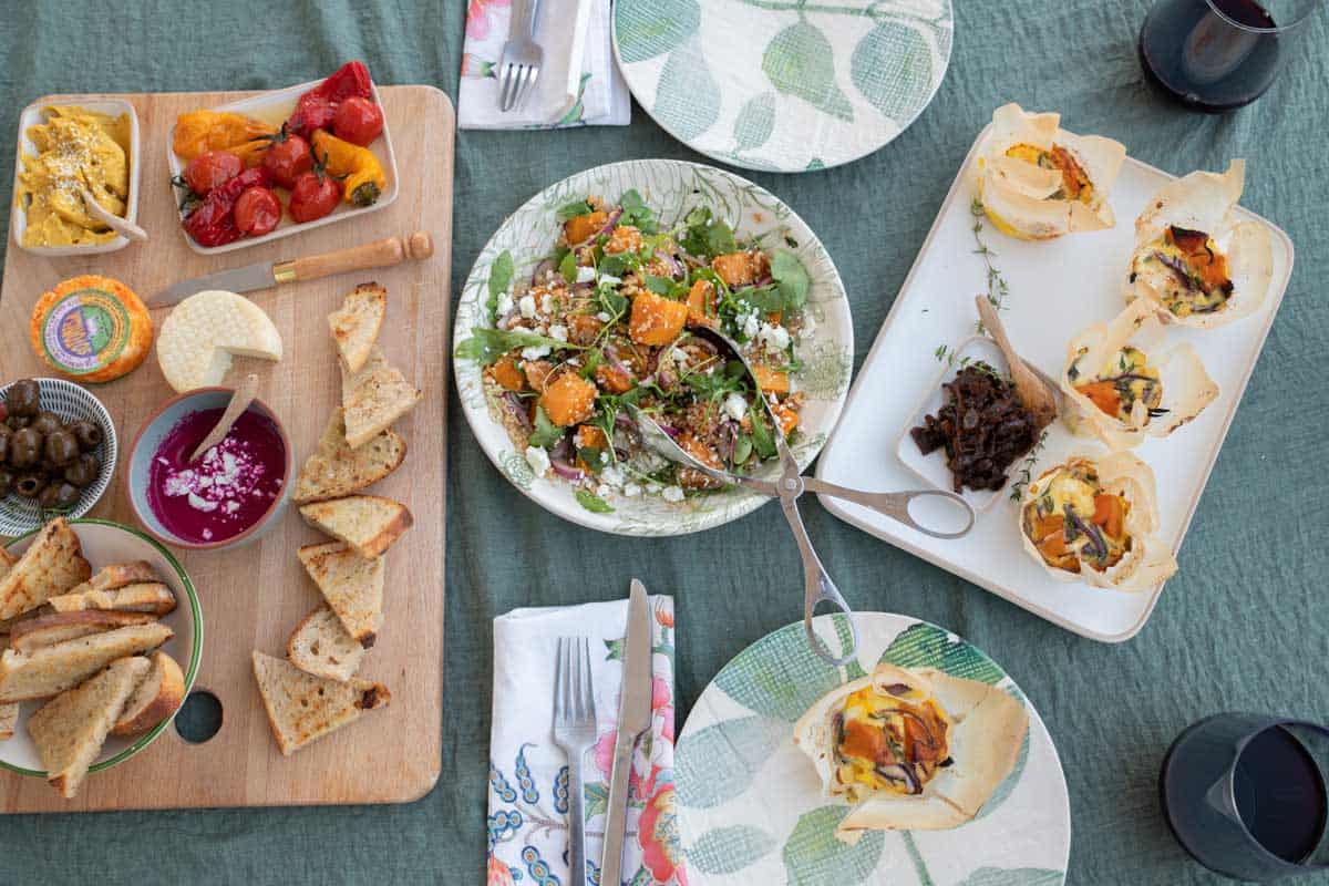 Fall inspired picnic spread with mezze platter, pumpkin quinoa salad and mii frittatas. 
