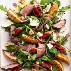 A salad with figs and goat cheese.