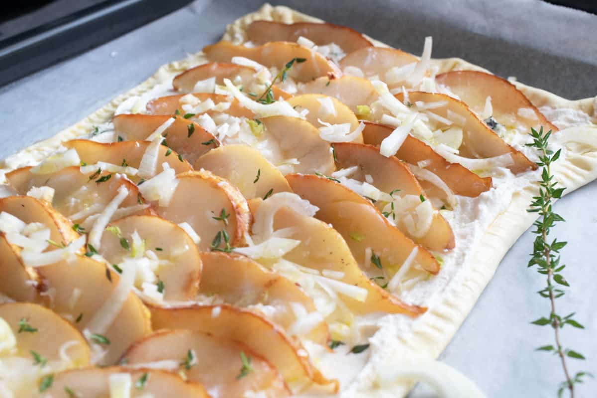 Pear tart with fennel and blue cheese before cooking.