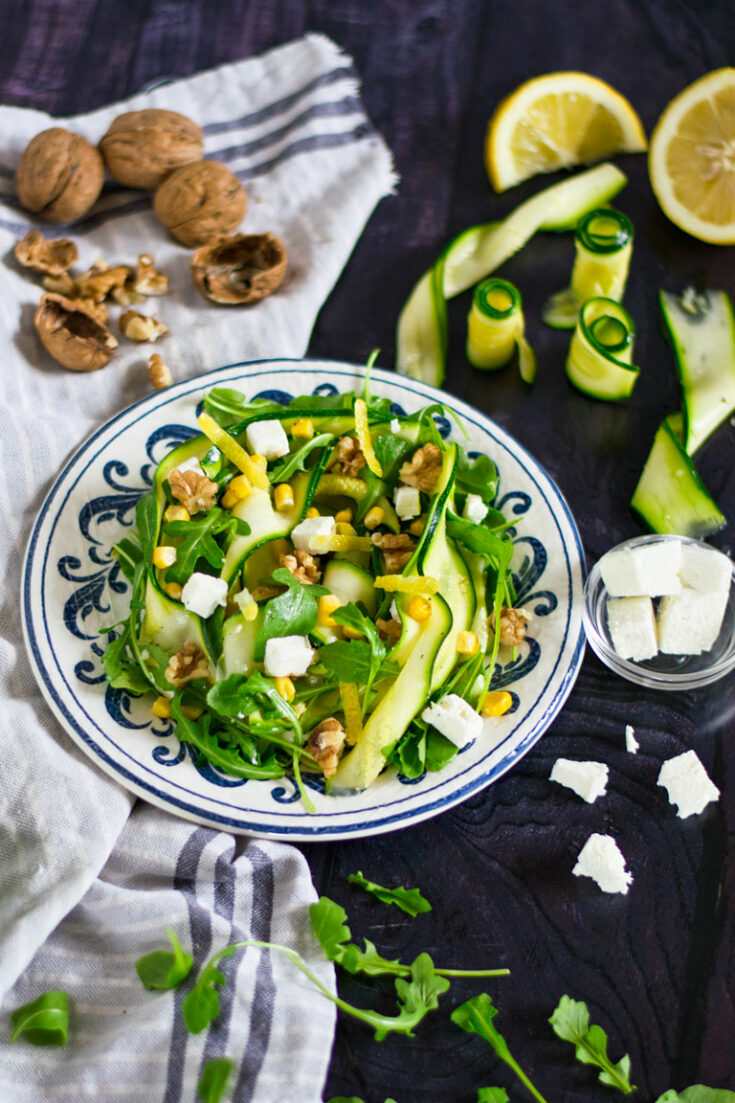 Colourful bowl of Zucchini salad with corn and feta.