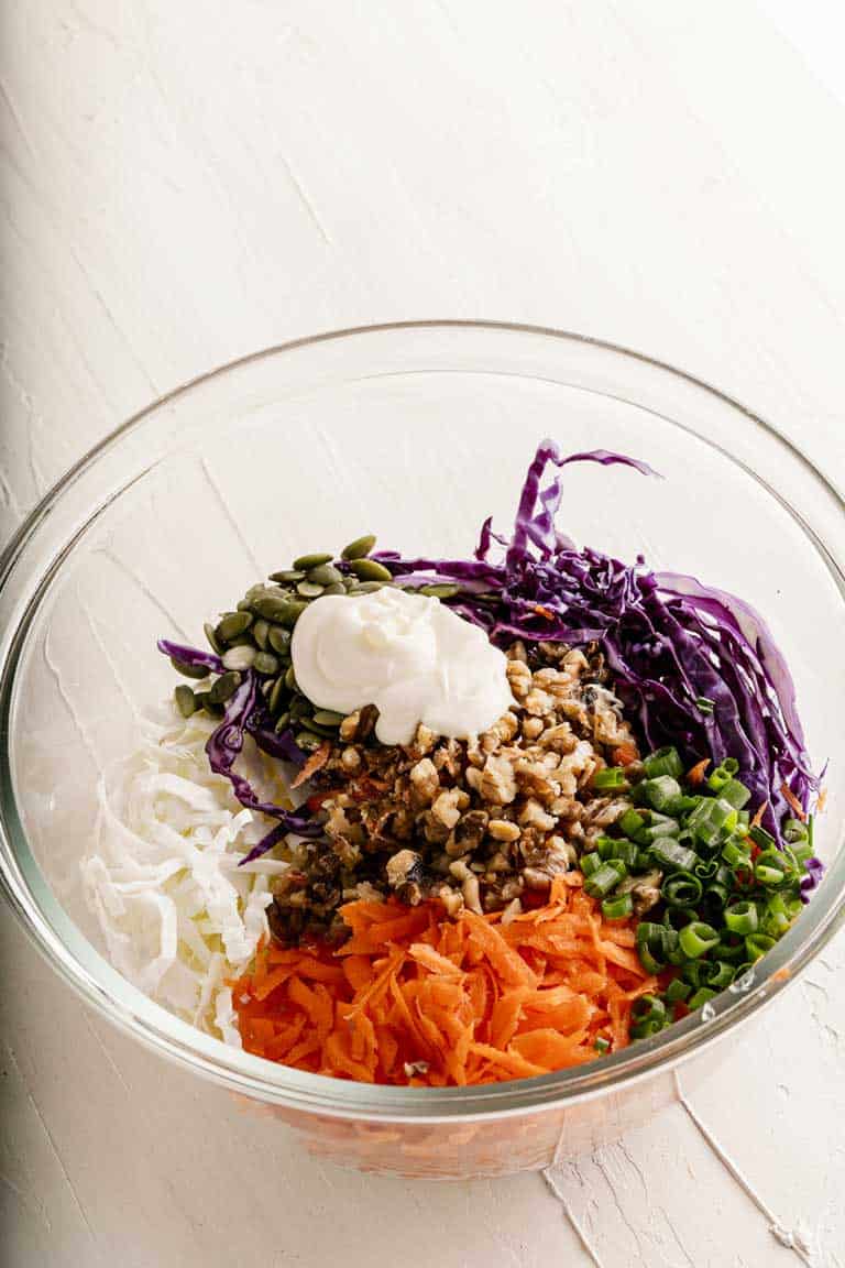 Coleslaw ingredients in a bowl before mixing.