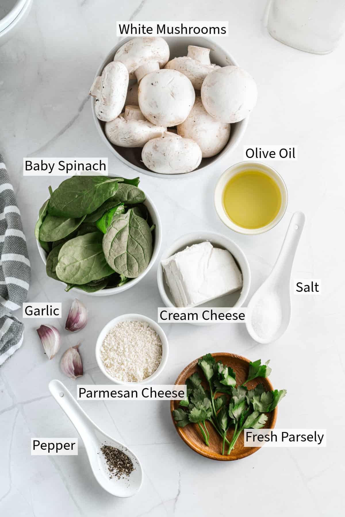 Ingredients for spinach and cream cheese stuffed mushrooms.
