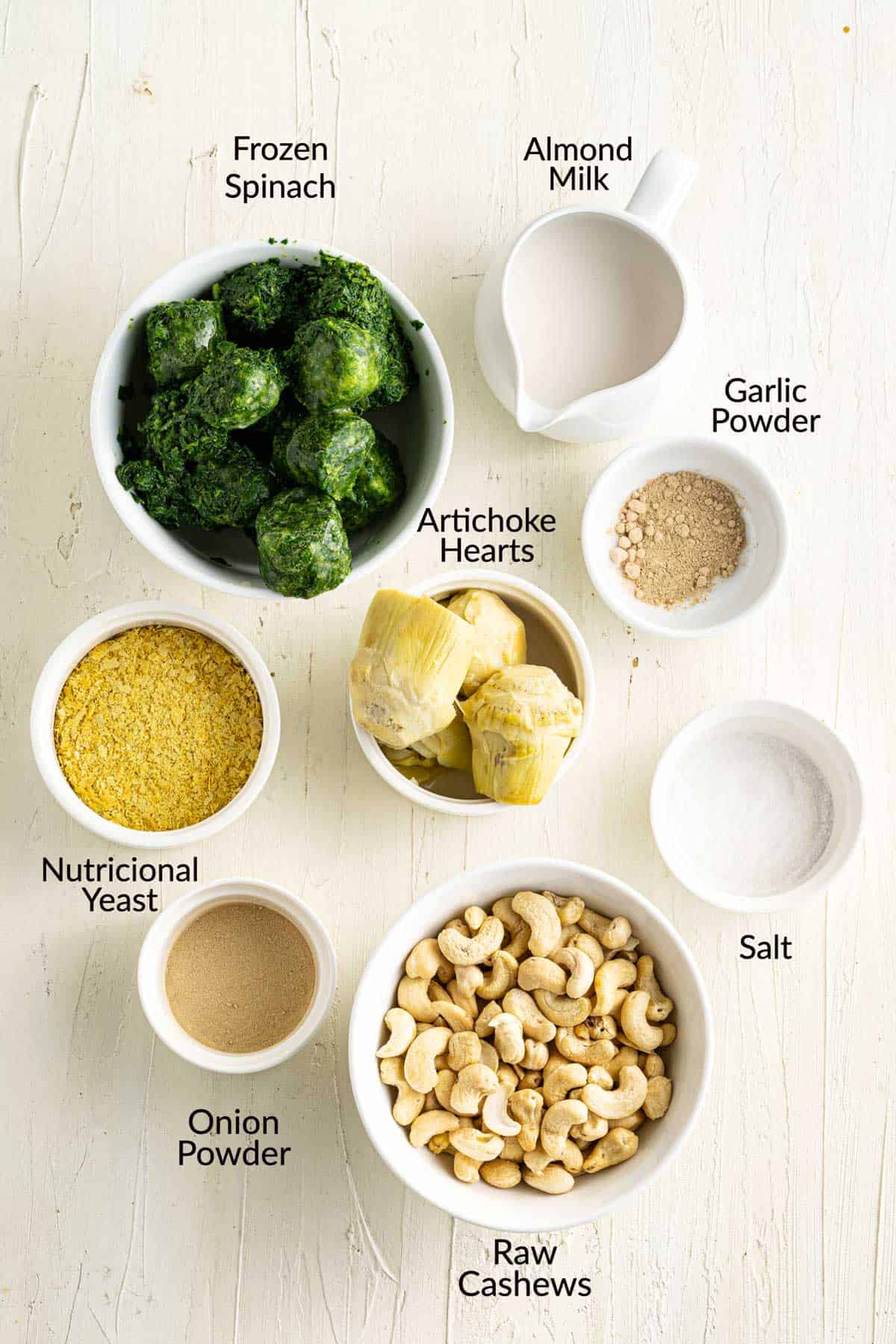 Ingredients for vegan spinach artichoke dip.