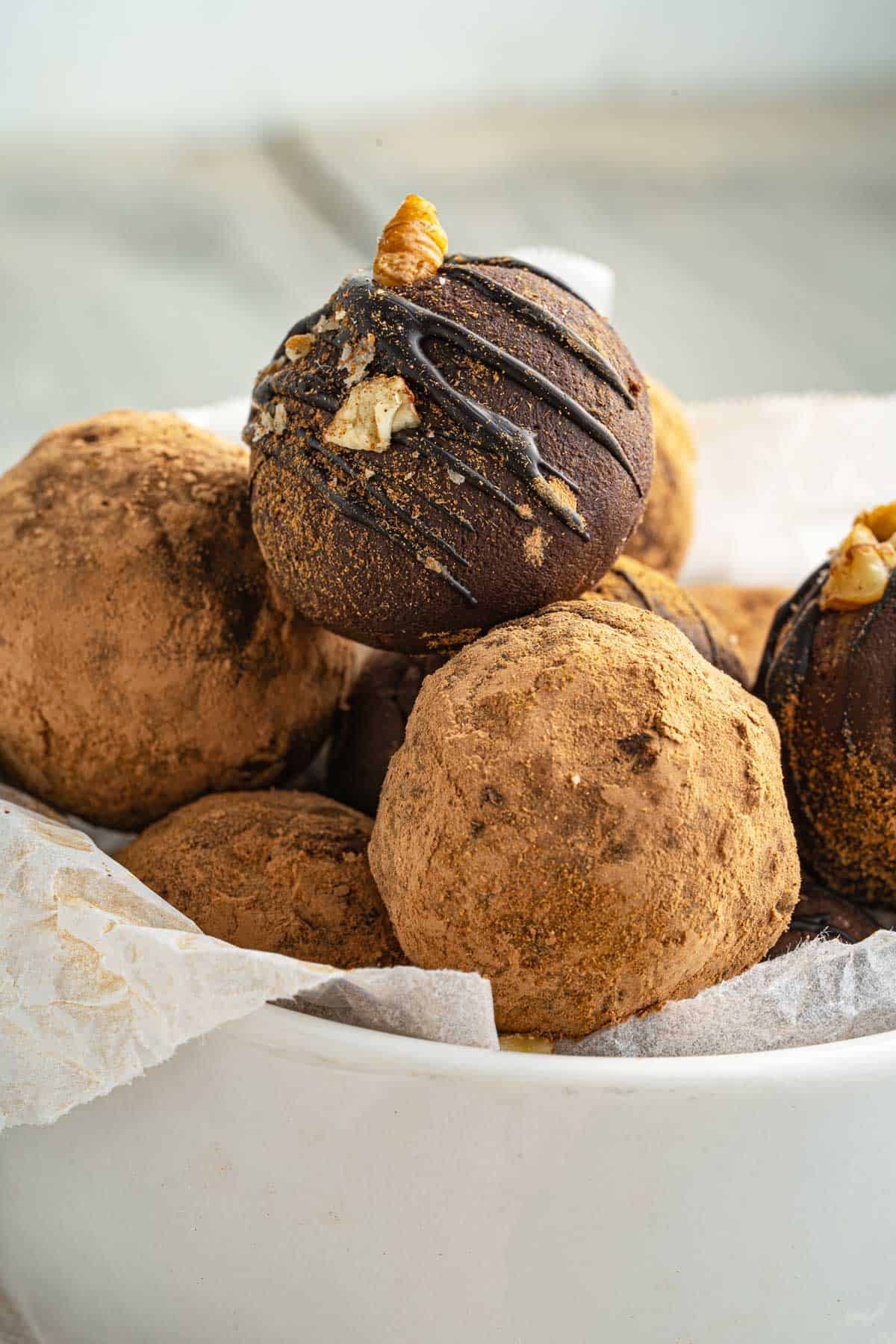 Chocolate Avocado Truffle balls in a bowl.