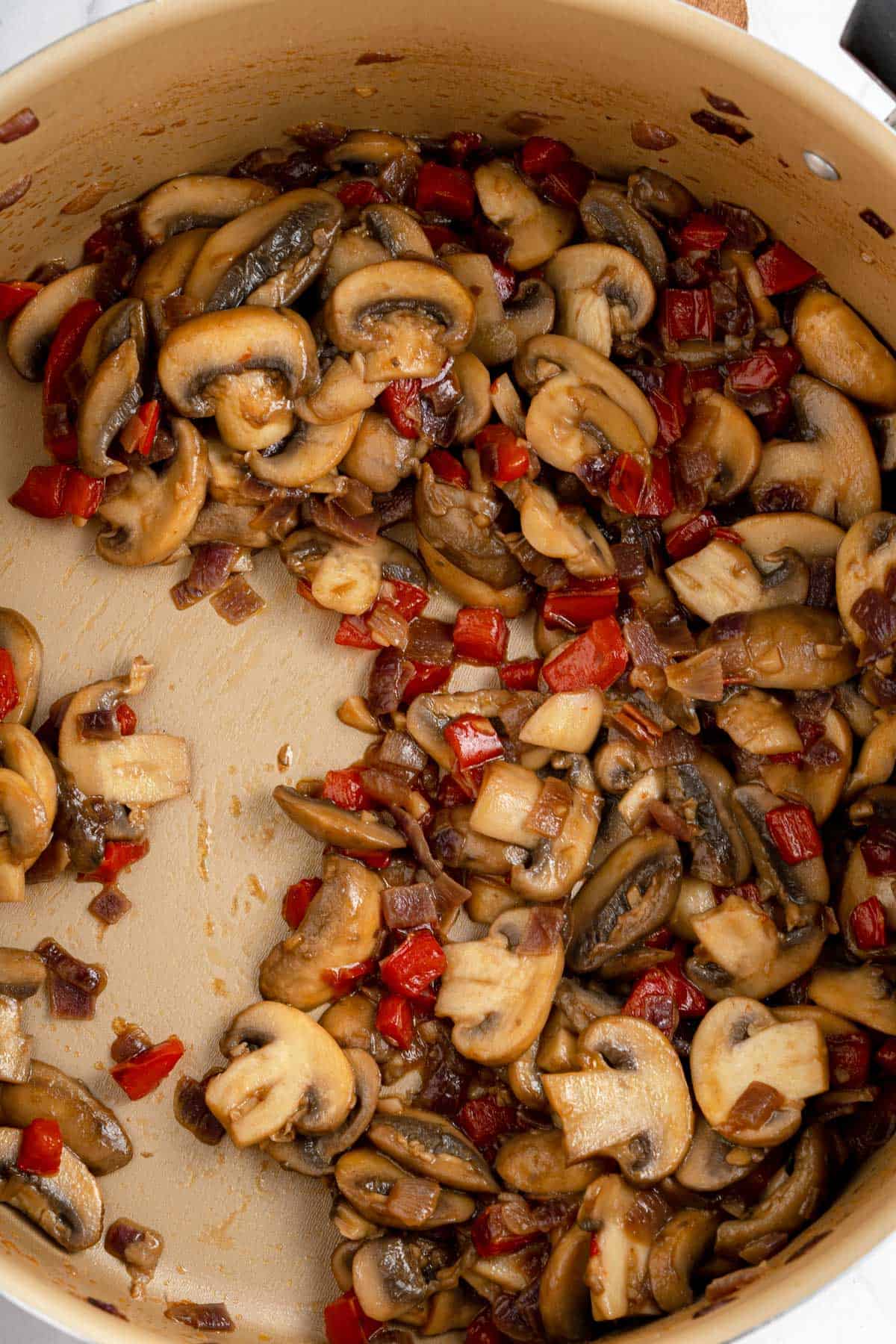 Sauteed mushrooms, red pepper and onion for quesadilla filling.