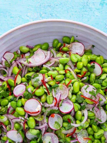 Bowl of green bean and radish salad.