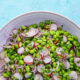Bowl of green bean and radish salad.