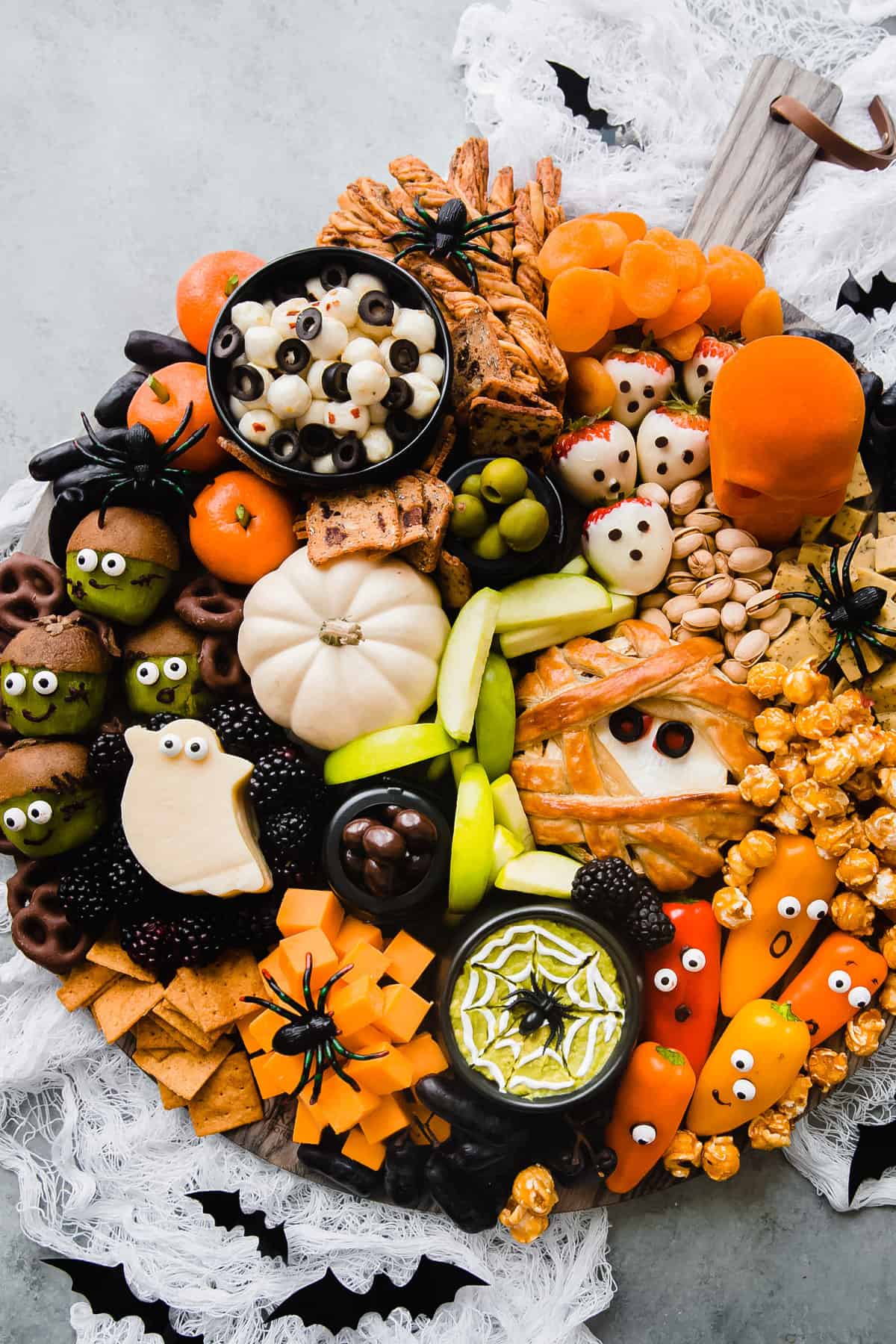 A platter of halloween snacks on a table.