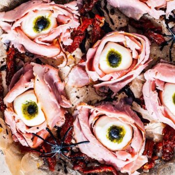 Ham eyeballs on a baking sheet.