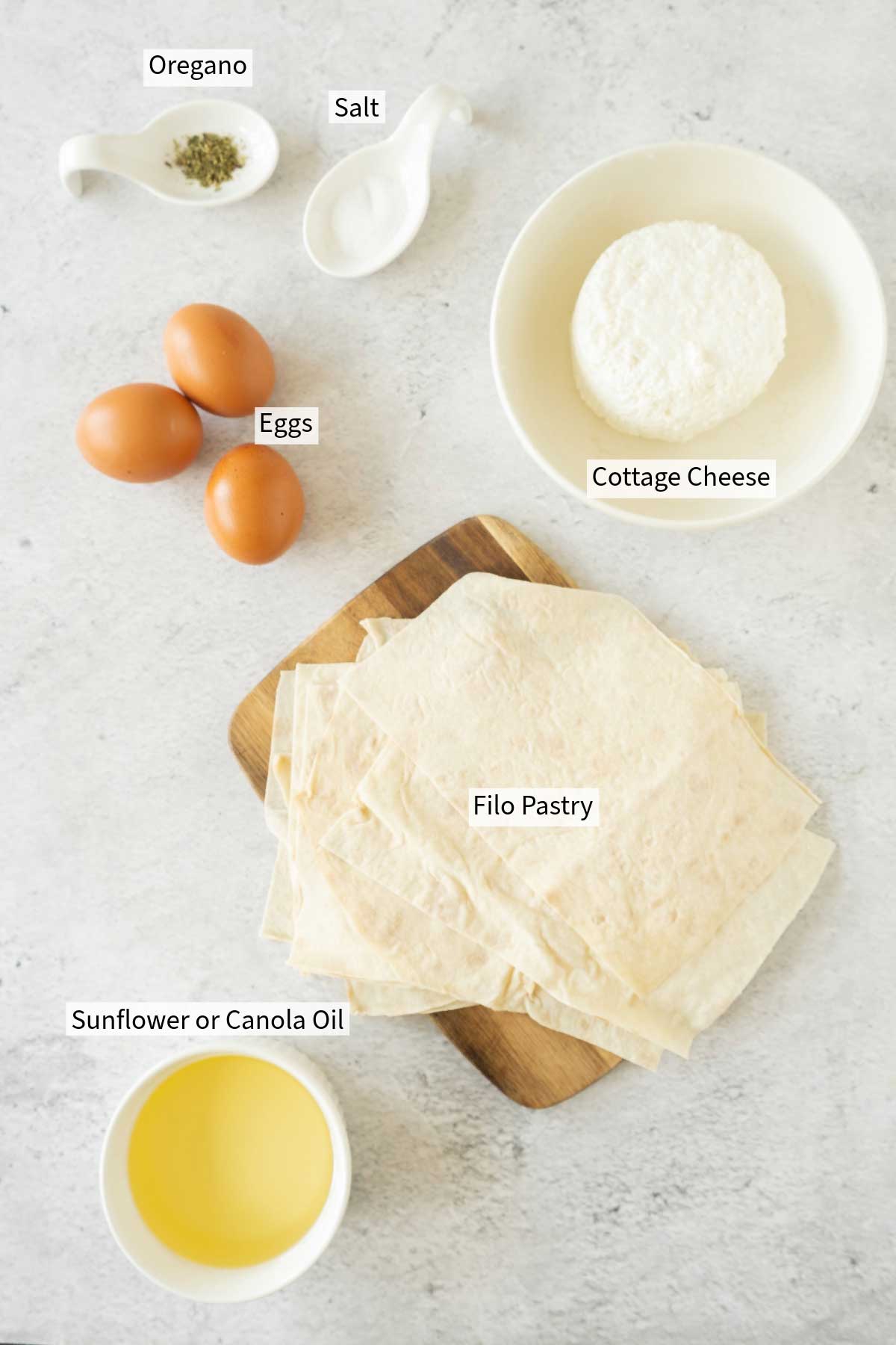 Ingredients for cheese pastry rolls with filo pastry. 