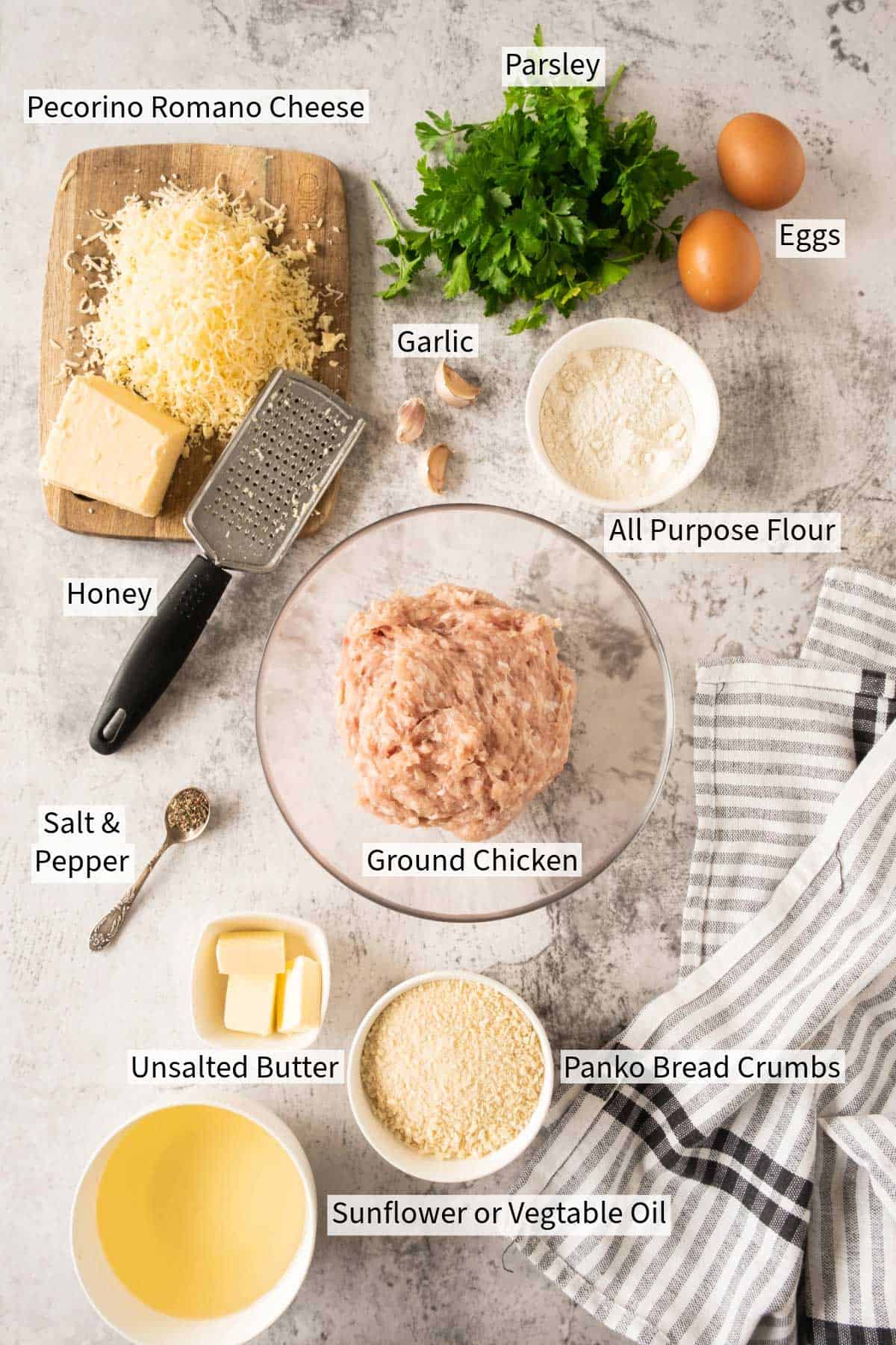 The ingredients for a chicken Kiev Balls laid out on a table.